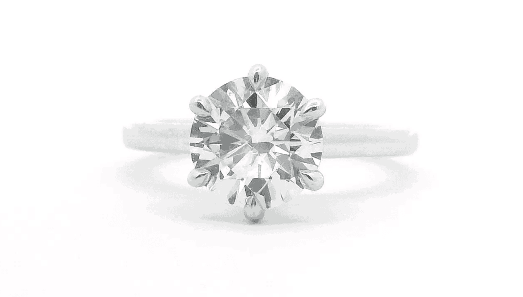 Engagement Rings 4 1.0ct engagement ring with a six-prong claw setting in a white gold band.